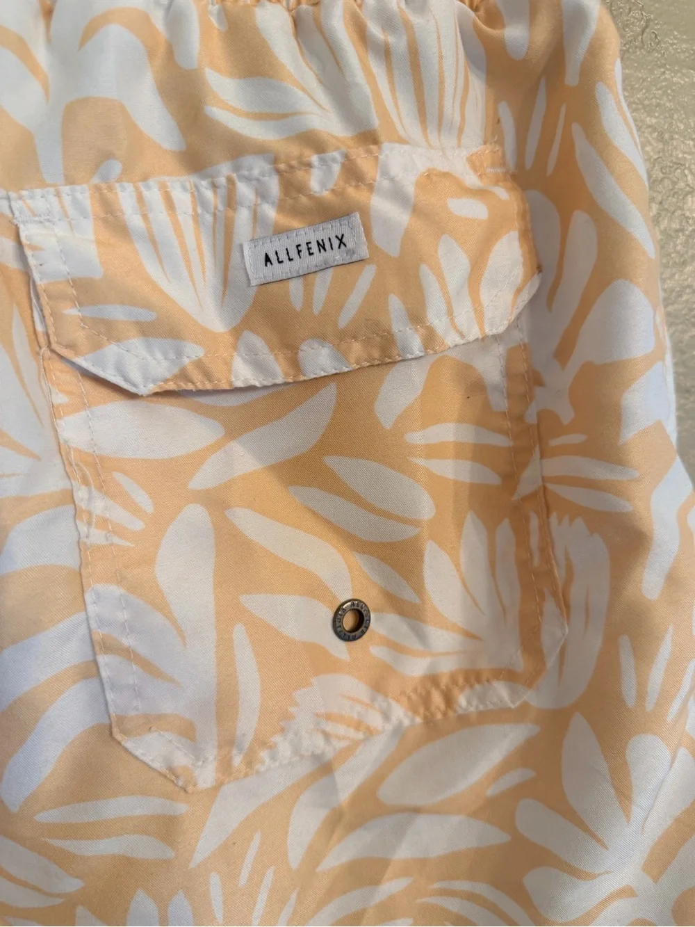Allfenix men’s yellow Floral swim trunks